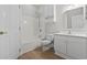 Bathroom featuring white cabinets, a shower and tub, and neutral tones at 4161 Hibiscus Dr. # 15-302, Little River, SC 29566