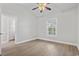 Cozy bedroom featuring natural light, ceiling fan, and hardwood floors at 4161 Hibiscus Dr. # 15-302, Little River, SC 29566