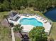 Aerial view of the community pool featuring several lounge chairs at 4161 Hibiscus Dr. # 15-302, Little River, SC 29566