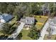 Aerial view of a well-maintained house with a long driveway and fenced-in backyard at 4350 Goude St., Murrells Inlet, SC 29576