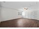 This bedroom is well-lit with wood-look floors, a ceiling fan, and two closets at 4350 Goude St., Murrells Inlet, SC 29576