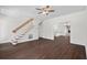 Spacious living room featuring hardwood floors, staircase, and an open floor plan at 4350 Goude St., Murrells Inlet, SC 29576