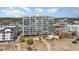 Aerial view of the condo complex with ocean views, a sandy beach, and lush landscaping at 4505 South Ocean Blvd. # 8-D, North Myrtle Beach, SC 29582