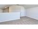 Finished attic with neutral carpeting and an access door at 491 Wagner Cir., Conway, SC 29526