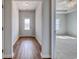 Inviting entryway featuring wood-look flooring leading into a bright, neutral-toned living space at 491 Wagner Cir., Conway, SC 29526