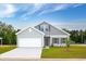 Charming single-Gathering home with manicured lawn, a two-car garage and inviting curb appeal at 491 Wagner Cir., Conway, SC 29526