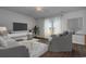 Modern living room featuring neutral tones, contemporary furnishings, and bright natural light at 491 Wagner Cir., Conway, SC 29526