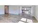 Spacious living room showcases stylish floors and an open floor plan to kitchen at 491 Wagner Cir., Conway, SC 29526