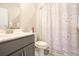 Bathroom featuring a shower with a playful patterned curtain, and a vanity for everyday use at 511 Rose Fountain Dr., Myrtle Beach, SC 29579