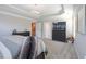 Spacious bedroom with a view of the hallway and a large television above the dresser at 511 Rose Fountain Dr., Myrtle Beach, SC 29579