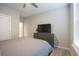 Neutral bedroom featuring a dresser with a television for entertainment and relaxation at 511 Rose Fountain Dr., Myrtle Beach, SC 29579