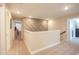 Upstairs hallway with decorative wall paneling and neutral carpet at 511 Rose Fountain Dr., Myrtle Beach, SC 29579