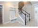 Entryway featuring a staircase, hall tree with storage and access to other rooms in the home at 511 Rose Fountain Dr., Myrtle Beach, SC 29579