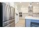 Contemporary kitchen featuring stainless steel appliances, white cabinetry, and a center island at 511 Rose Fountain Dr., Myrtle Beach, SC 29579