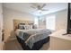 Serene main bedroom with a rustic wood headboard and coastal-themed decor at 511 Rose Fountain Dr., Myrtle Beach, SC 29579