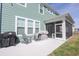 Backyard patio with a grill and seating, perfect for outdoor cooking and relaxation at 511 Rose Fountain Dr., Myrtle Beach, SC 29579