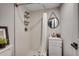 Bathroom featuring a sleek shower with white tiling, vanity with mounted sink, and stylish fixtures at 5137 Highway 17 Business # 3A, Murrells Inlet, SC 29576