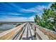 Picturesque boardwalk featuring a wooden path stretching through the marshland, perfect for scenic walks at 5137 Highway 17 Business # 3A, Murrells Inlet, SC 29576