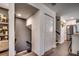 Hallway featuring modern decor and a glimpse into the updated kitchen space at 5137 Highway 17 Business # 3A, Murrells Inlet, SC 29576