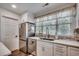 Well-lit kitchen area with stainless steel appliances, modern fixtures, and neutral color palette at 5137 Highway 17 Business # 3A, Murrells Inlet, SC 29576