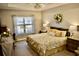 Cozy bedroom with large bed, natural light, and neutral color scheme at 517 Brooksher Dr., Myrtle Beach, SC 29588