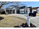 Beautiful single-story residence featuring a well-maintained yard, brick and vinyl siding, and a wide driveway at 517 Brooksher Dr., Myrtle Beach, SC 29588