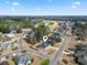 Aerial view of home in neighborhood, nearby golf course and pond at 547 Bucks Trail, Longs, SC 29568