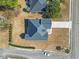 Aerial shot of home with landscaped yard and driveway at 547 Bucks Trail, Longs, SC 29568