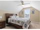 Bedroom featuring a king bed, ceiling fan, and a window providing natural light at 547 Bucks Trail, Longs, SC 29568