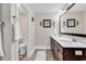 Bathroom with double vanity, modern fixtures, and a separate toilet room for added privacy at 5572 Redleaf Rose Dr., Myrtle Beach, SC 29579