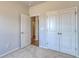 Bedroom with double closets and a view into the entryway at 620 Mccorkle Place, Conway, SC 29526