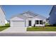 Charming single-Gathering home with a two-car garage and a well-maintained lawn on a sunny day at 620 Mccorkle Place, Conway, SC 29526