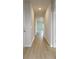 Bright hallway with light wood floors, fresh paint, and recessed lighting at 620 Mccorkle Place, Conway, SC 29526