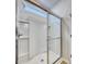 Modern shower with glass door and side panels, with shelves and clear accents at 620 Mccorkle Place, Conway, SC 29526