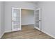 Home study features French doors, ample natural light, and wood flooring at 620 Mccorkle Place, Conway, SC 29526