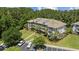 Aerial view of condo complex featuring lush landscaping, ample parking, and multiple units at 6253 Catalina Dr. # 632, North Myrtle Beach, SC 29582