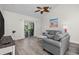 Bright and airy living room with cozy seating, a balcony, and contemporary decor at 6253 Catalina Dr. # 632, North Myrtle Beach, SC 29582