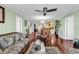 The open living space connects a dining room and kitchen to the living room at 638 S Waccamaw Dr., Murrells Inlet, SC 29576