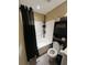 Bright bathroom with a tub/shower combination and storage unit for organization at 6500 Colonial Dr. # 2, Myrtle Beach, SC 29572