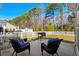 Inviting backyard featuring a patio, grill, and privacy fence, perfect for outdoor entertaining at 725 Old Castle Loop, Myrtle Beach, SC 29579