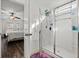 Bright bathroom features a glass shower stall with sleek fixtures next to the bedroom at 725 Old Castle Loop, Myrtle Beach, SC 29579