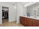 Clean bathroom with a double sink vanity, wood cabinets, and plenty of counter space at 725 Old Castle Loop, Myrtle Beach, SC 29579