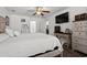 Large main bedroom with an attached ensuite bathroom, wood floors, and comfortable seating at 725 Old Castle Loop, Myrtle Beach, SC 29579