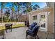 Outdoor patio with grill and brick oven, providing a perfect space for cooking and relaxation at 725 Old Castle Loop, Myrtle Beach, SC 29579