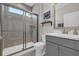 Well-designed bathroom with a glass-enclosed shower, modern vanity, and neutral tones at 7322 Sarteano Dr., Myrtle Beach, SC 29572