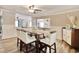 Dining room with hardwood floors and a large dining table with seating for six at 7609 Driftwood Dr., Myrtle Beach, SC 29572