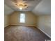 Spacious bedroom featuring plush carpet, a ceiling fan, and bright natural light at 1000 Weldon Ln., Conway, SC 29526