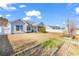 Exterior view of the home with a patio, gardening space, and a large storage container at 1032 Cadbury Ct., Conway, SC 29527