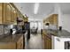 Modern kitchen featuring oak cabinets, granite countertops, and stainless steel appliances at 1032 Cadbury Ct., Conway, SC 29527