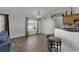 Comfortable living room featuring hardwood floors, a window with natural light and a breakfast bar at 1032 Cadbury Ct., Conway, SC 29527